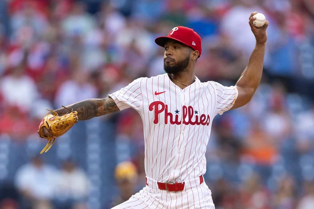 a Philadelphia Phillies player pitching a ball