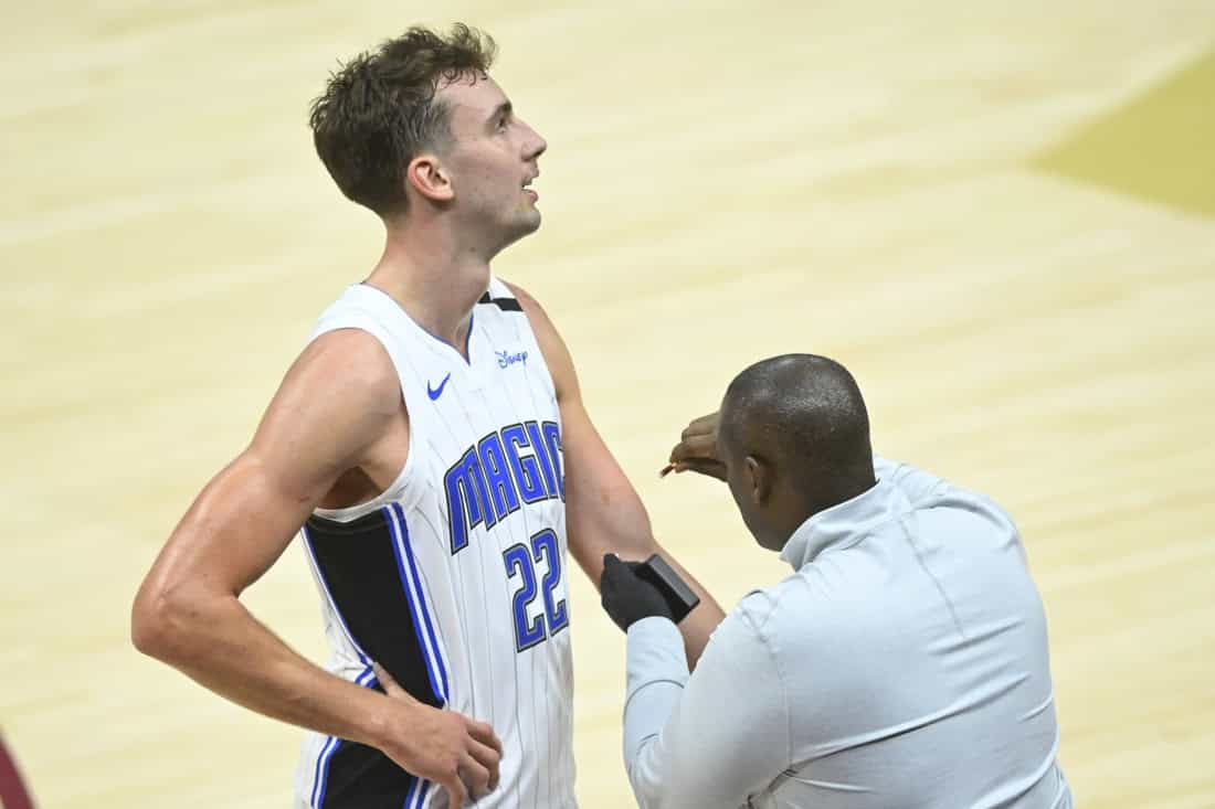 MAgic player being coached