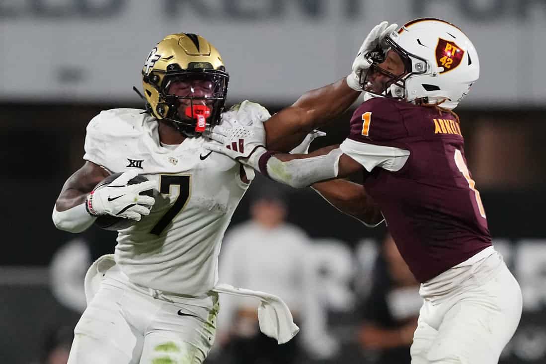 UCF Player Blocking a Tackle