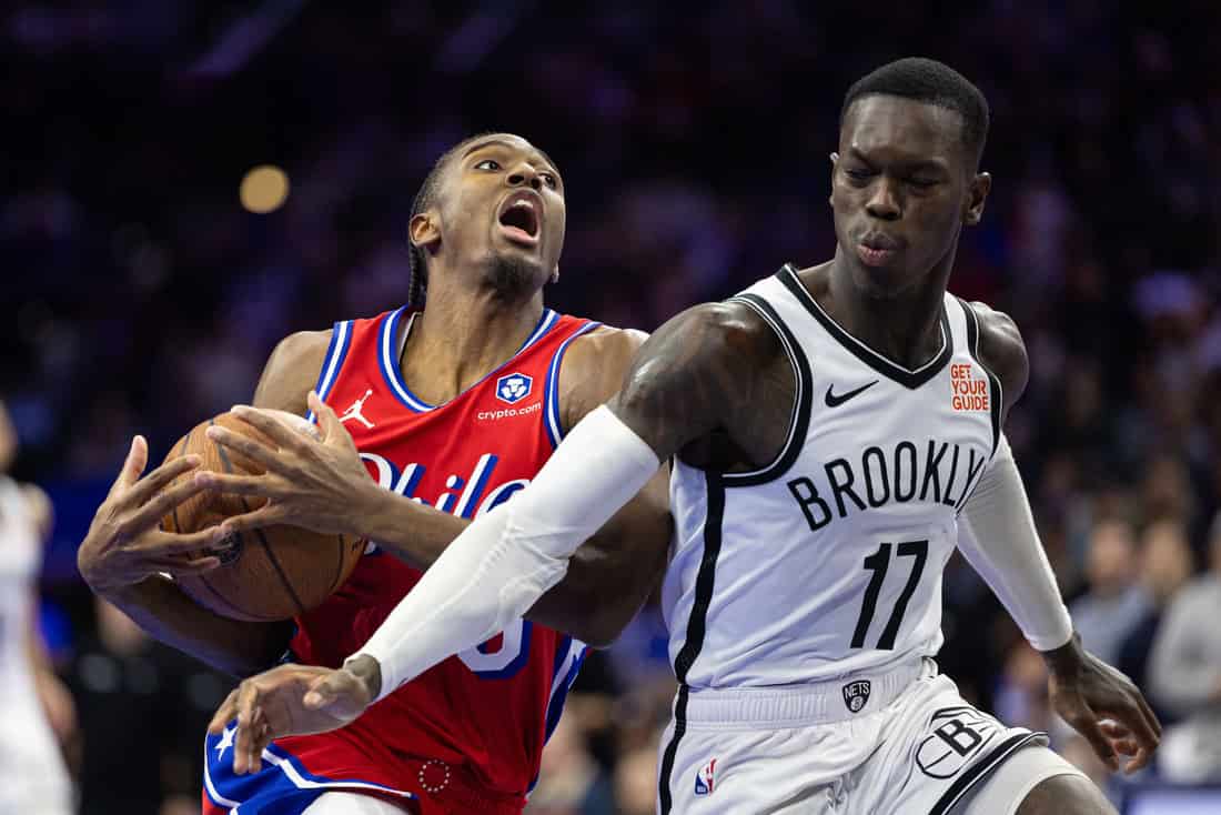 76ers player going for a layup