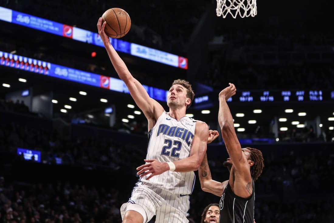 Magic Player Doing a Lay up