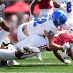 Football player making a tackle