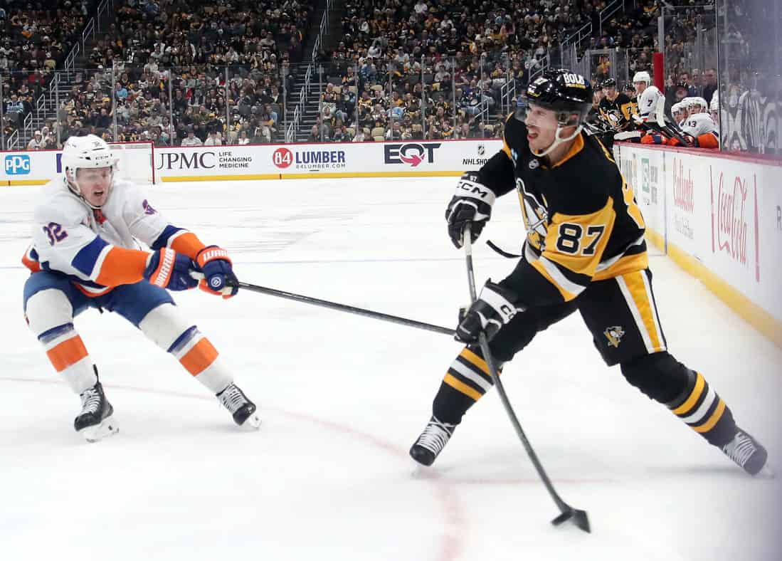 Penguins Player Shooting the puck