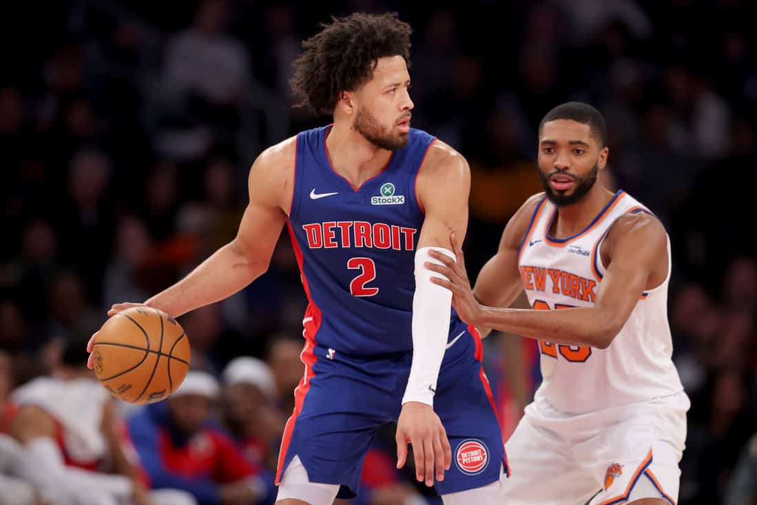 Pistons Player Guarding the ball